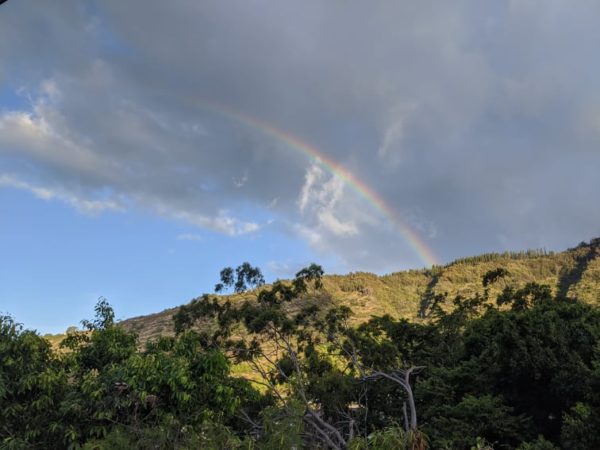 A rainbow over a mountainside in Hawaii displaying the beauty in something seemingly meaningless. 